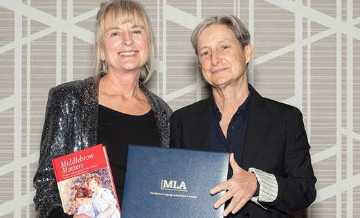 Professor Diana Holmes receives her award. February 2020