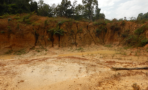 Tailing pond and mining pit landscape at mining site near Mahdia, Guyana