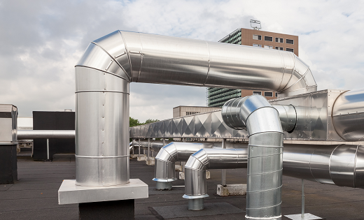 Air-conditioning pipes on the roof of a building.
