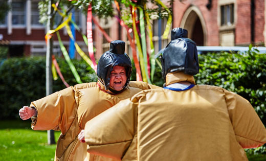 The inflatable sumo suits were a big hit, as were the reusable ribbons (seen in the background of this photo) we used across the Festival site instead of balloons. July 2019