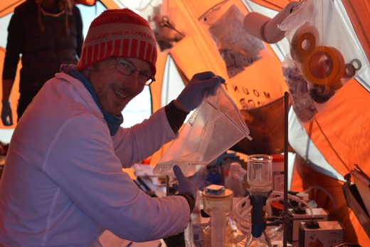 Filtering in the lab tent – the woolly hat was an vital piece of PPE!