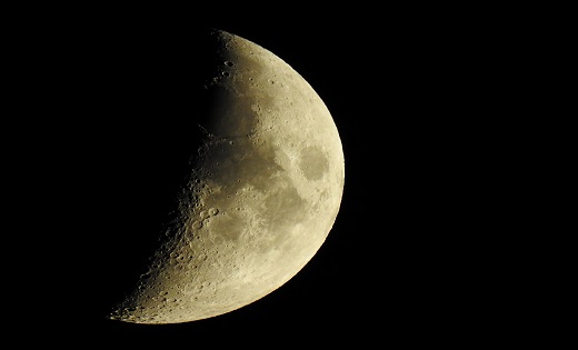 Half crescent moon with black background