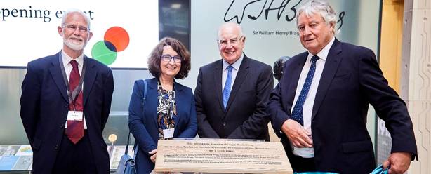 Vice-Chancellor Simone Buitendijk and other dignitaries around the plaque at the opening of the Sir William Henry Bragg Building.