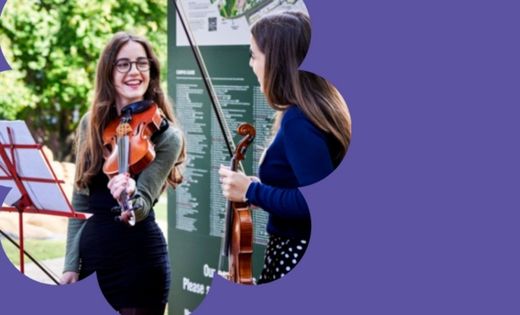 Violinists Rosie and Rachel are pictured performing as part of Campus Live.