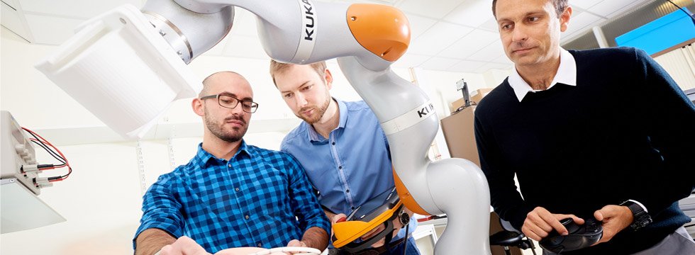 Professor Pietro Valdastri and some of his team test a robotic arm. December 2019