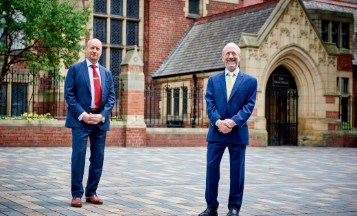 Professors David Sebag-Montefiore and John Ladbury stand outside the Great Hall. July 2020.