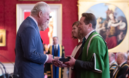 Professor Nick Plant and Dr Amanda Maycock receive the Queen's Anniversary Prize from Prince Charles and Princess Anne.